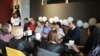 People attend a Ukrainian language transition class run by a nongovernmental organization. 