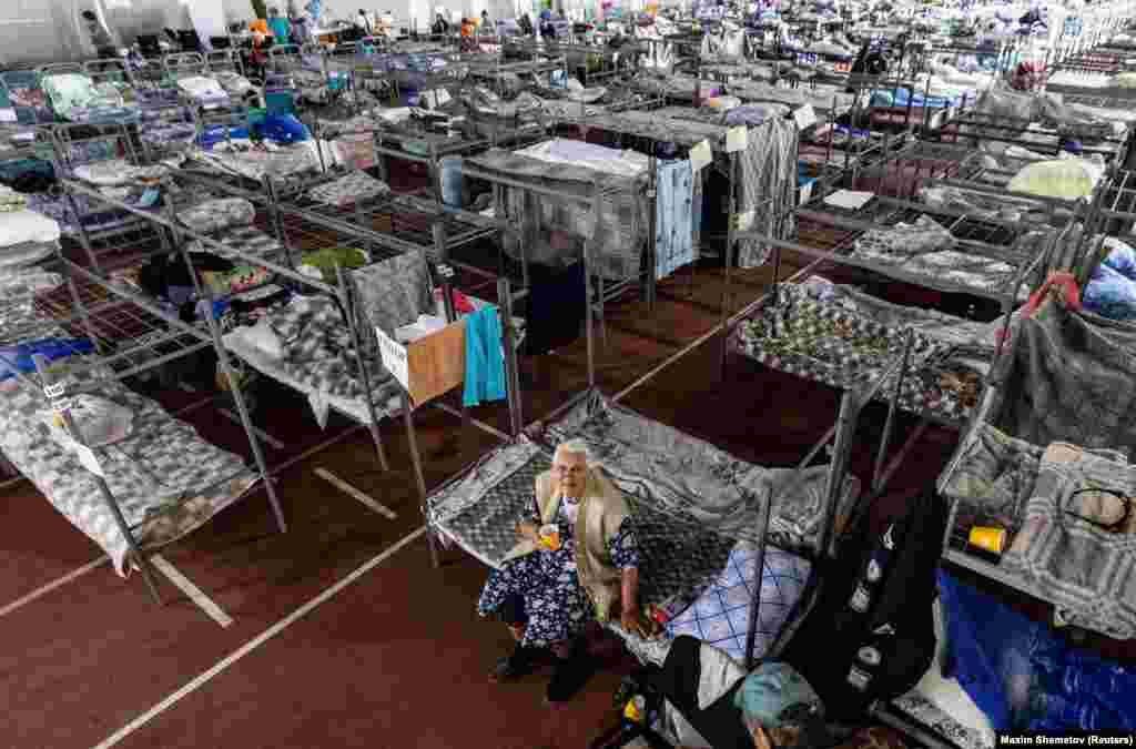 This June 7 photo shows an elderly woman from the Shebekino district of Russia’s Belgorod region in temporary accommodation in Belgorod. Thousands of people in recent days have been evacuated from the Shebekino district, which borders Ukraine. 