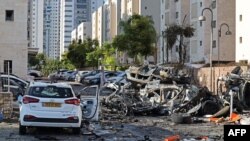 Згорілі машини в Ашкелоні після ракетного обстрілу Ізраїлю із Сектора Гази, 7 жовтня 2023 року