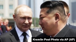 Володимир Путін і лідер Північної Кореї Кім Чен Ин. Пхеньян, 19 червня 2024 року 