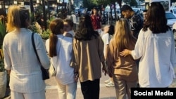 Iranian women flaunt the mandatory hijab rule. (file photo)