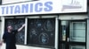 Richard Hyman, great-grandson of "Titanic" survivor Joseph Abraham Hyman, in front of the family business in Manchester, England, his great-grandfather started a year after the "Titanic" sank.