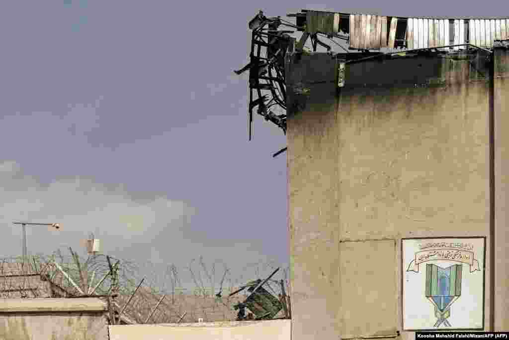 Fire damage to the exterior of the prison. An RFE/RL reporter was told that a riot began in a ward of the prison where political prisoners are held. Hundreds of people arrested for taking part in the anti-government protests sweeping the country had been sent to the prison before the blaze broke out.