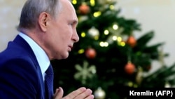 RUSSIA -- Russian President Vladimir Putin addresses his annual press conference via a video link at the Novo-Ogaryovo state residence outside Moscow, December 17, 2020