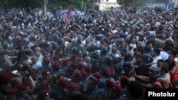 Armenia - Riot police clash with opposition protesters in Yerevan, June 3, 2022.