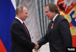 Володимир Путін і Сергій Ролдугін