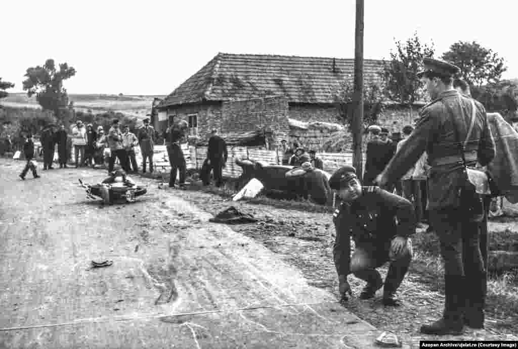 Other photo captions capture the finger-wagging tone of Romania's state-run media. This image of the aftermath of a 1965 traffic accident came with the text: "Here are the shocking consequences of carelessness! The car in the ditch, the motorbike in the middle of the road. Its owner is mourned by his parents and children.... Let us hasten to learn the lesson: Safe transport is also a matter of collective responsibility and precaution."