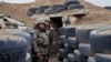 NAGORNO-KARABAKH -- Ethnic Armenian soldiers stand at a fighting position on the frontline, October 21, 2020