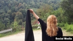 Under Islamic laws enforced in Iran since the 1979 revolution, women are required to cover their hair and body in public. Today, some women have removed their scarves while driving or otherwise in public to protest the laws. (illustrative photo)