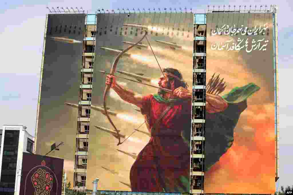 A propaganda billboard depicts the legendary mythical archer Arash in the Iranian capital, Tehran. 