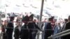 Полицейские опечатывают вход в торговый дом "Арай" по предписанию суда. Павлодар, 15 сентября 2011 года.
