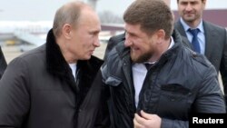 Vladimir Putin pictured with Ramzan Kadyrov in 2011.