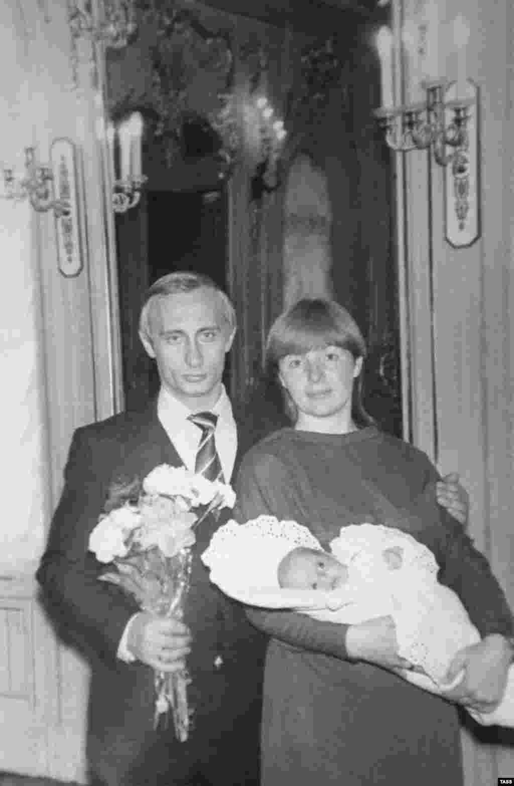 Vladimir Putin, his wife, Lyudmila, and daughter Maria in a photograph from the spring of 1985