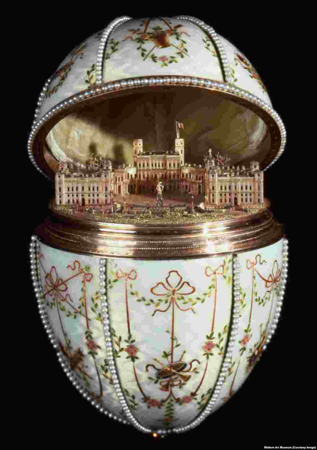 The tsar's one request for the eggs was that they contain some kind of "surprise." In the case of the Gatchina Palace Egg, the egg opened to a gold replica of the royal residence in the countryside of St. Petersburg. The 8-centimeter building is precise down to the hedges, gravel courtyard, and fluttering flag of the real palace.