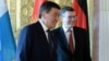 Germany's Merkel Urged To Tackle Rights Situation In Talks With Kyrgyz President