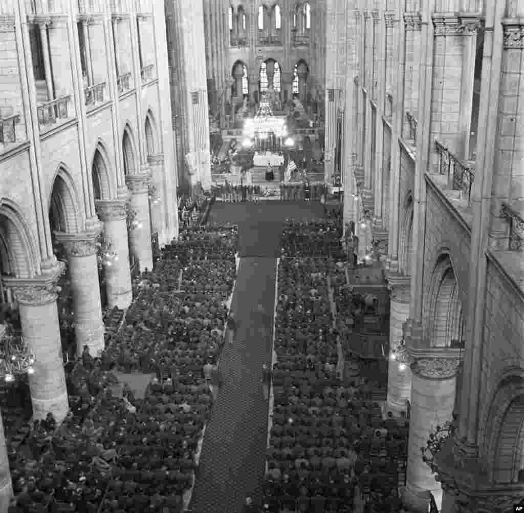 U.S. soldiers fill the pews of Notre Dame Cathedral on April 16, 1945, during the GI memorial service for U.S. President Roosevelt. This was less than a year after the liberation of the city during World War II.