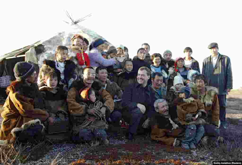 On September 23, 2008, Medvedev poses with reindeer herders in the town of Kanchalan in Russia&#39;s Chukotka region.
