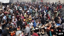 Centru de distribuire a alimentelor din tabăra de refugiați Nuseirat din centrul Fâșiei Gaza. 19 iulie 2025. 