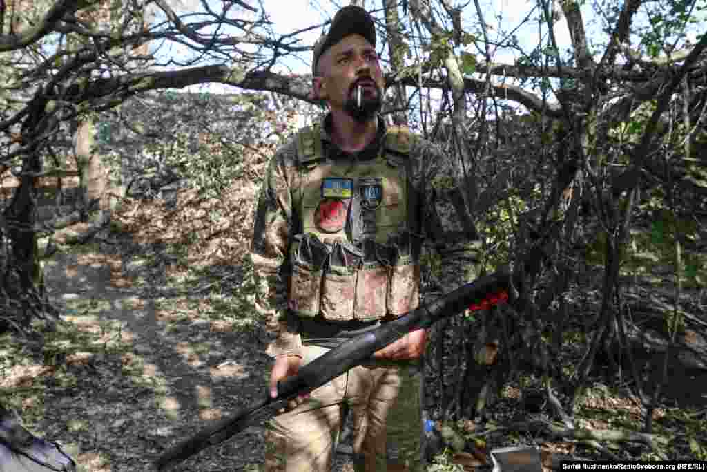 Artem readies a shotgun as a drone is heard overhead in early October. As of October 8, Russian forces are around 6 kilometers from Pokrovsk and appear to be focusing their entire war efforts in Donetsk on capturing the city. 