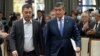 The new prime minister of Kyrgyzstan, Sadyr Japarov (left), and the former president, Sooronbai Jeenbekov, in Bishkek on October 16