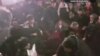 A video recording by a witness shows a group of mostly young men throwing punches at each other, and grabbing and pulling each other’s jackets. 
