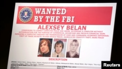 An FBI wanted poster featuring suspected Russian hackers 