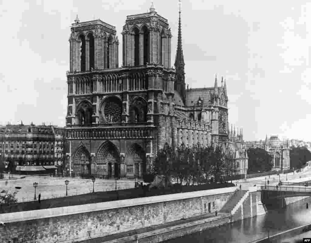 The cathedral on the island in the River Seine, the Ile de la Cite, is seen in a photo from 1911.