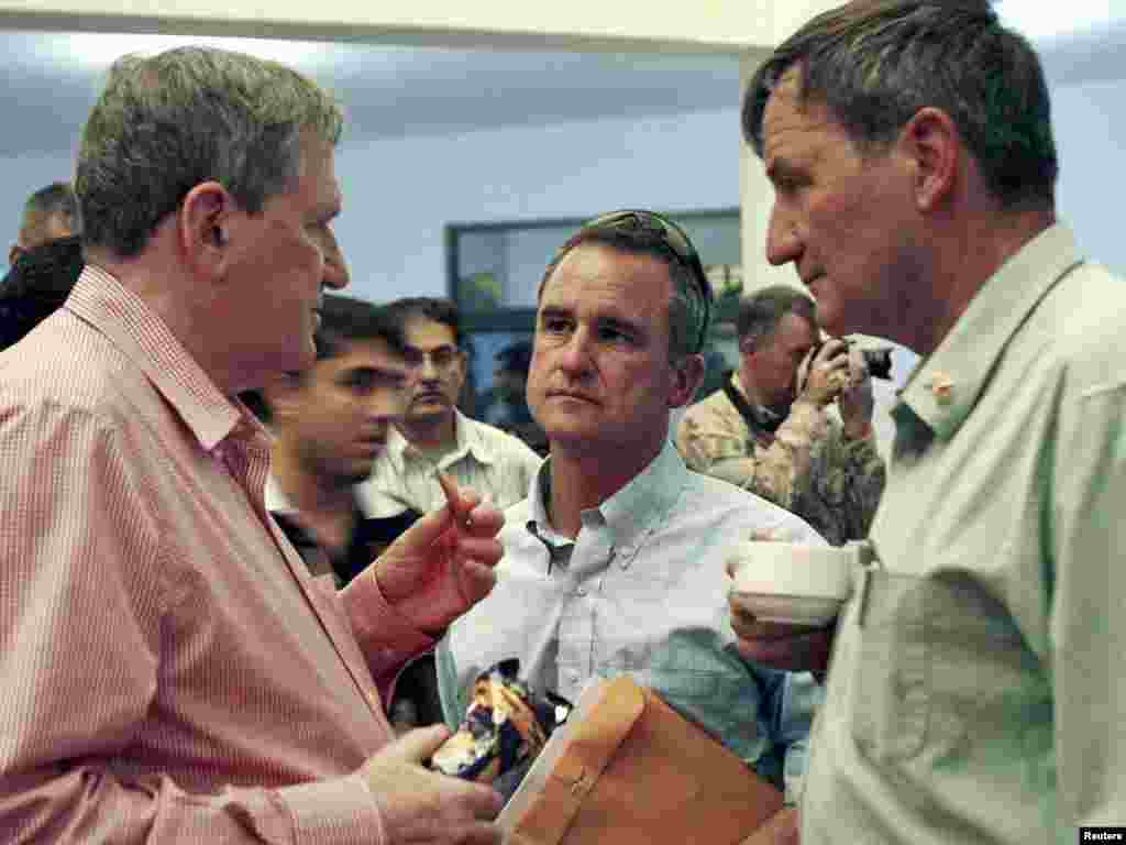 Richard Holbrooke talks with U.S. Ambassador to Afghanistan Karl Eikenberry during a visit to Kandahar on June 21, 2010.