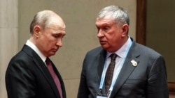 Ігор Сєчин (п) та Володимир Путін у Пекіні, 26 квітня 2019 року