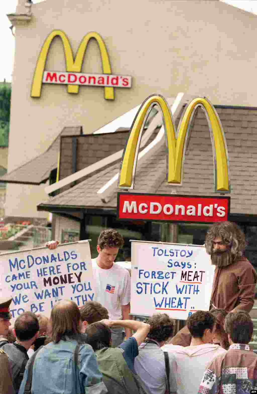 It wasn't all plain sailing for McDonald's in its early days in Russia. Here, Russian animal rights activists protest outside an outlet in 1992. 