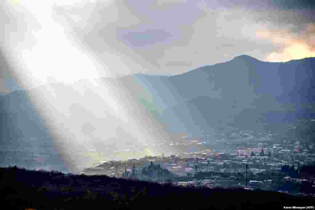 A shaft of sunlight illuminates a suburb in Stepanakert (known as Xankendi in Azeri) on November 27.