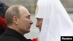 Президент Росії Володимир Путін і патріарх РПЦ Кирило (архівне фото)