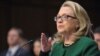 Clinton Defends Dept. In Benghazi Hearing